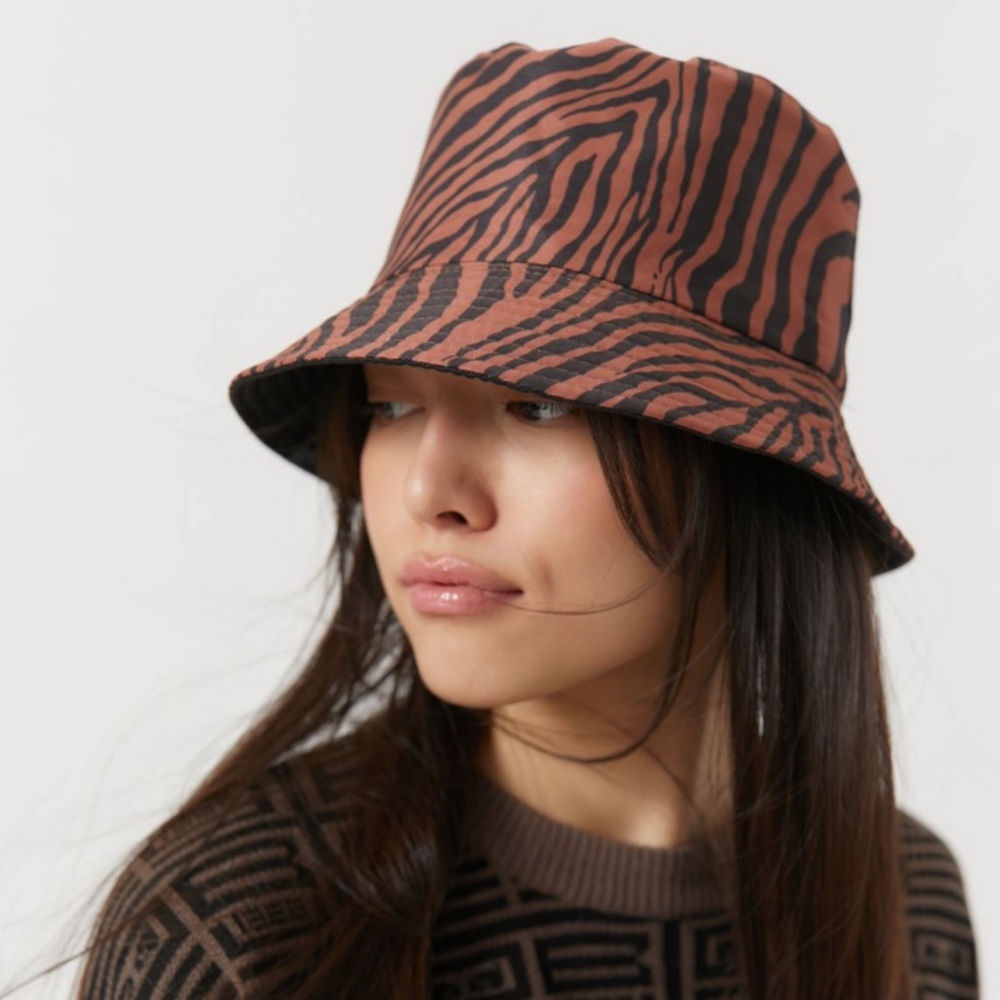 Urban Outfitters tiger print bucked hat.